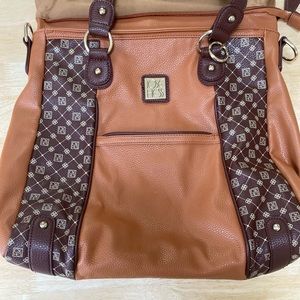 Famed designer Jose Hess signature "I Love You" bag. Fully lined interior